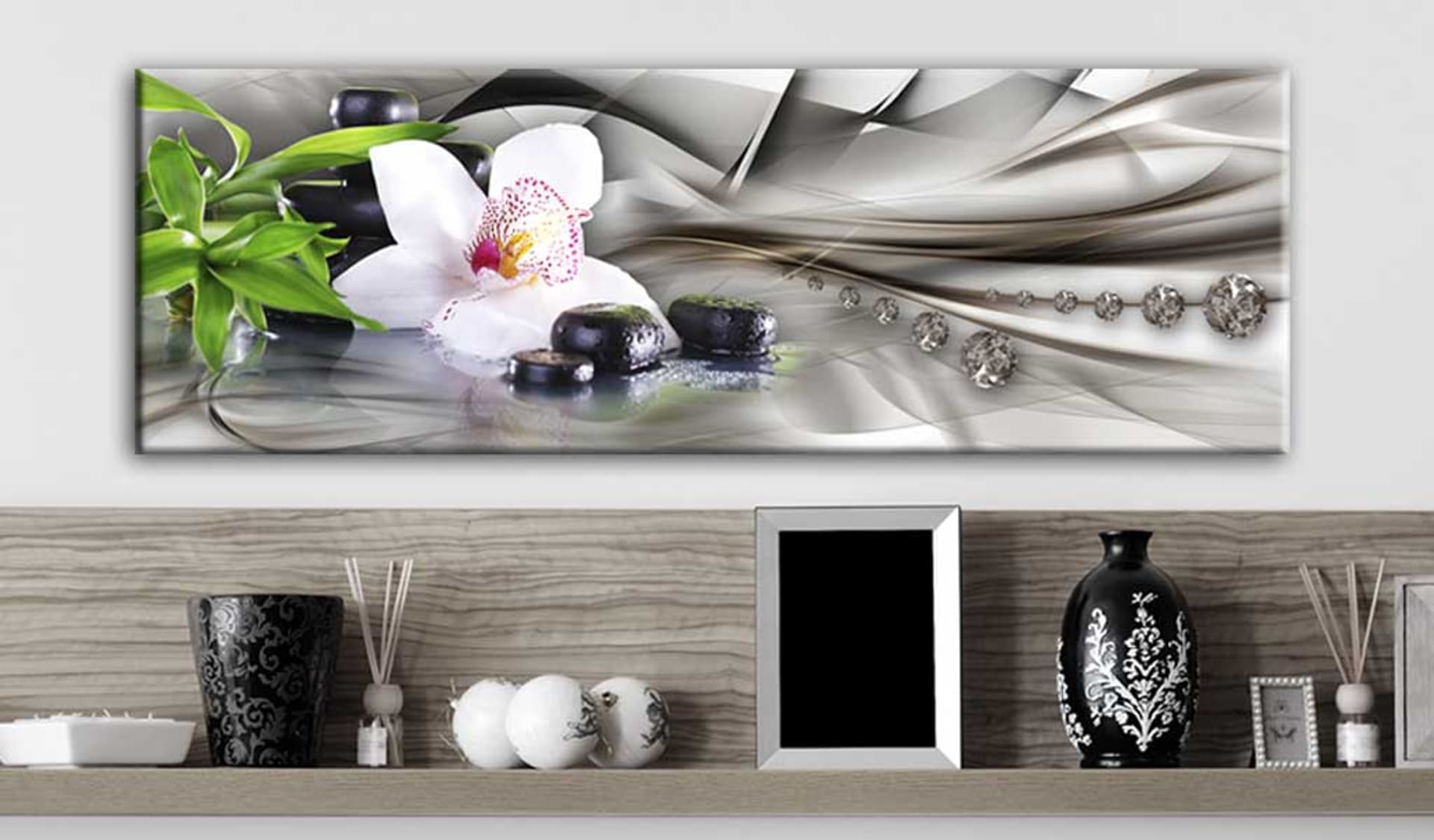 

Obraz - Kompozycja Zen: bambus, orchidea i kamienie (rozmiar 120x40)