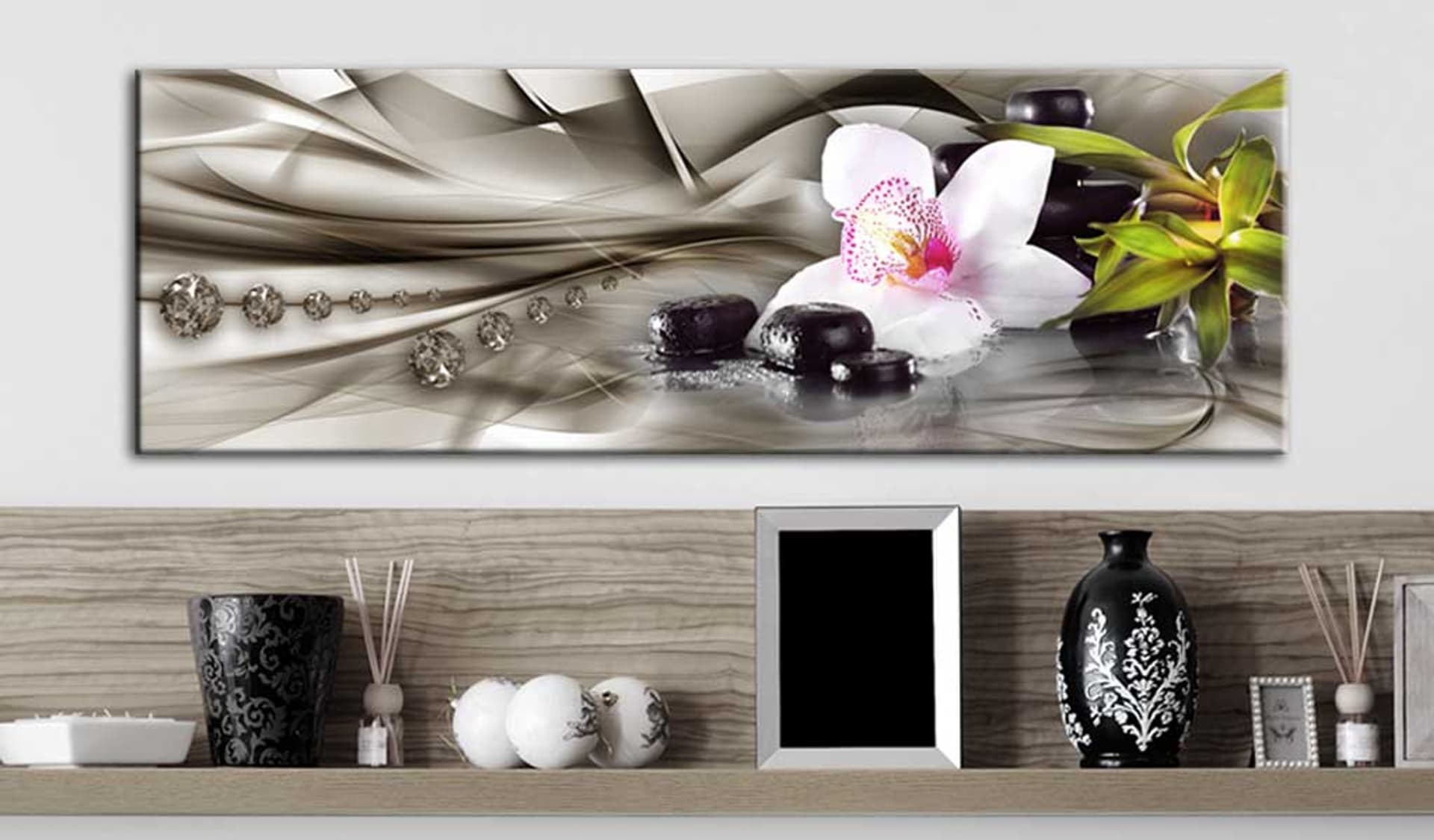 

Obraz - Kompozycja zen: orchidea, bambus i kamienie (rozmiar 135x45)