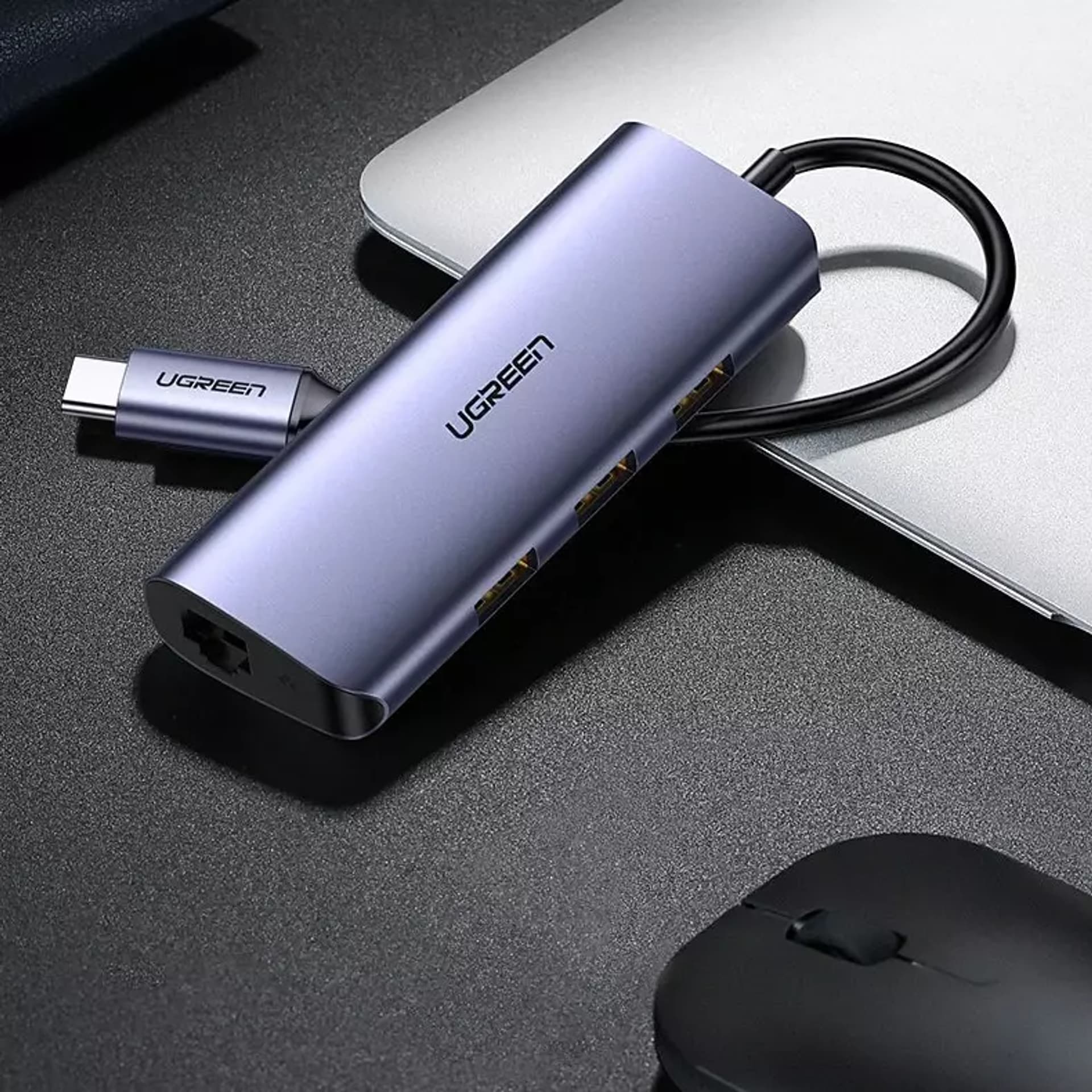 

Ugreen wielofunkcyjny adapter HUB USB Typ C - 3 x USB / Ethernet RJ-45 / micro USB szary (CM252)