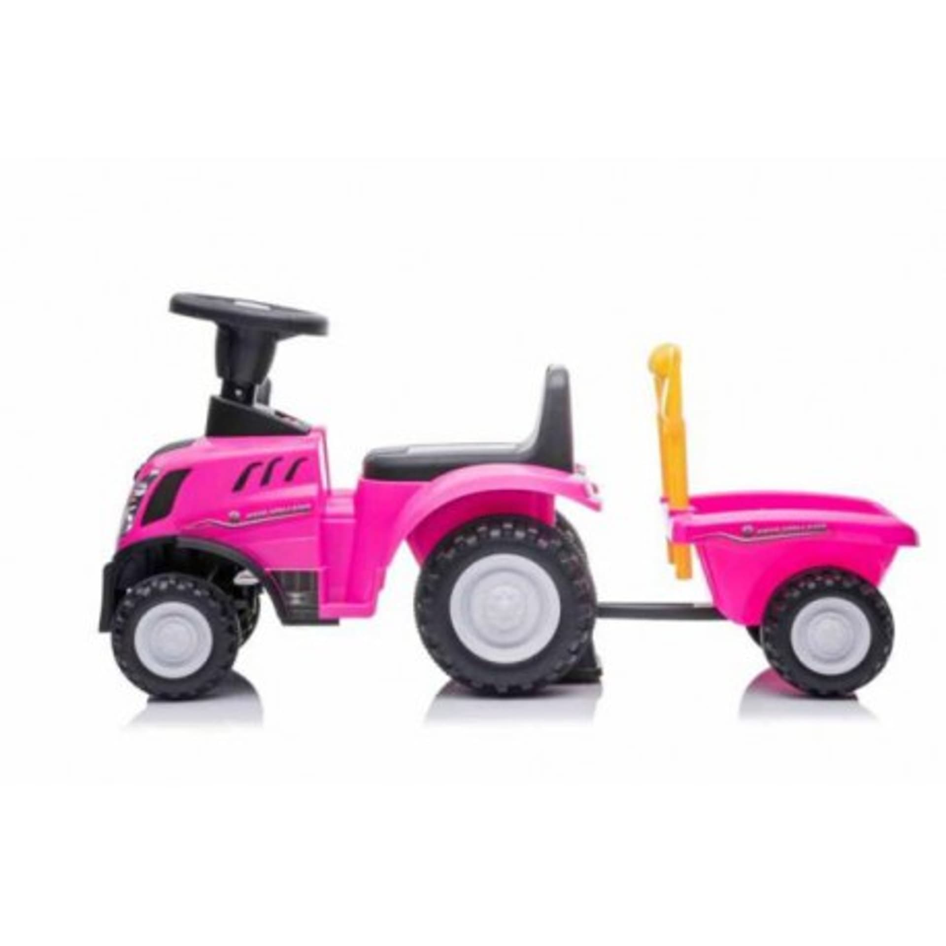 

Jeździk traktor z przyczepą new holland różowy
