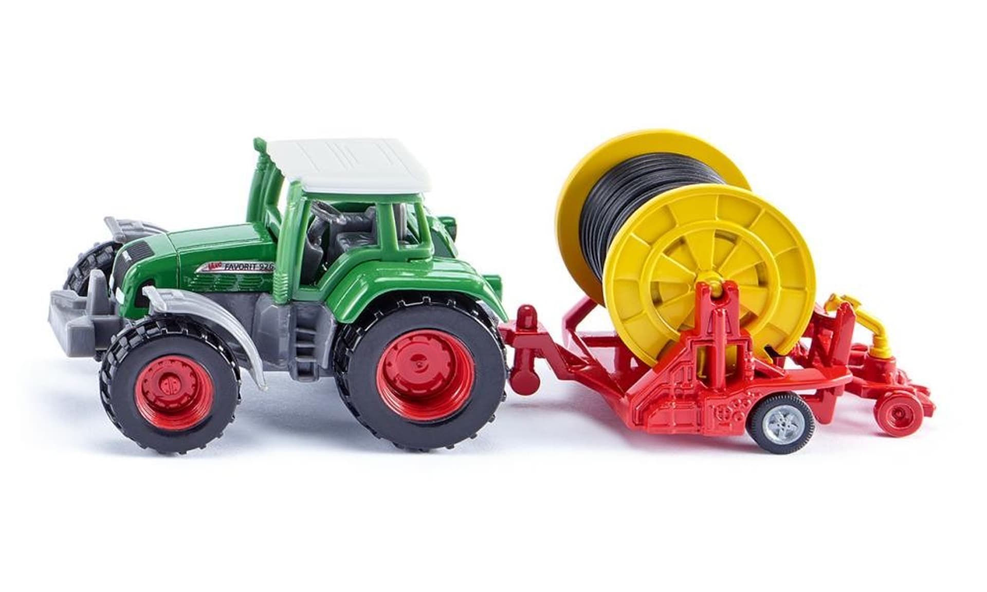 

Traktor z deszczownicą szpulową