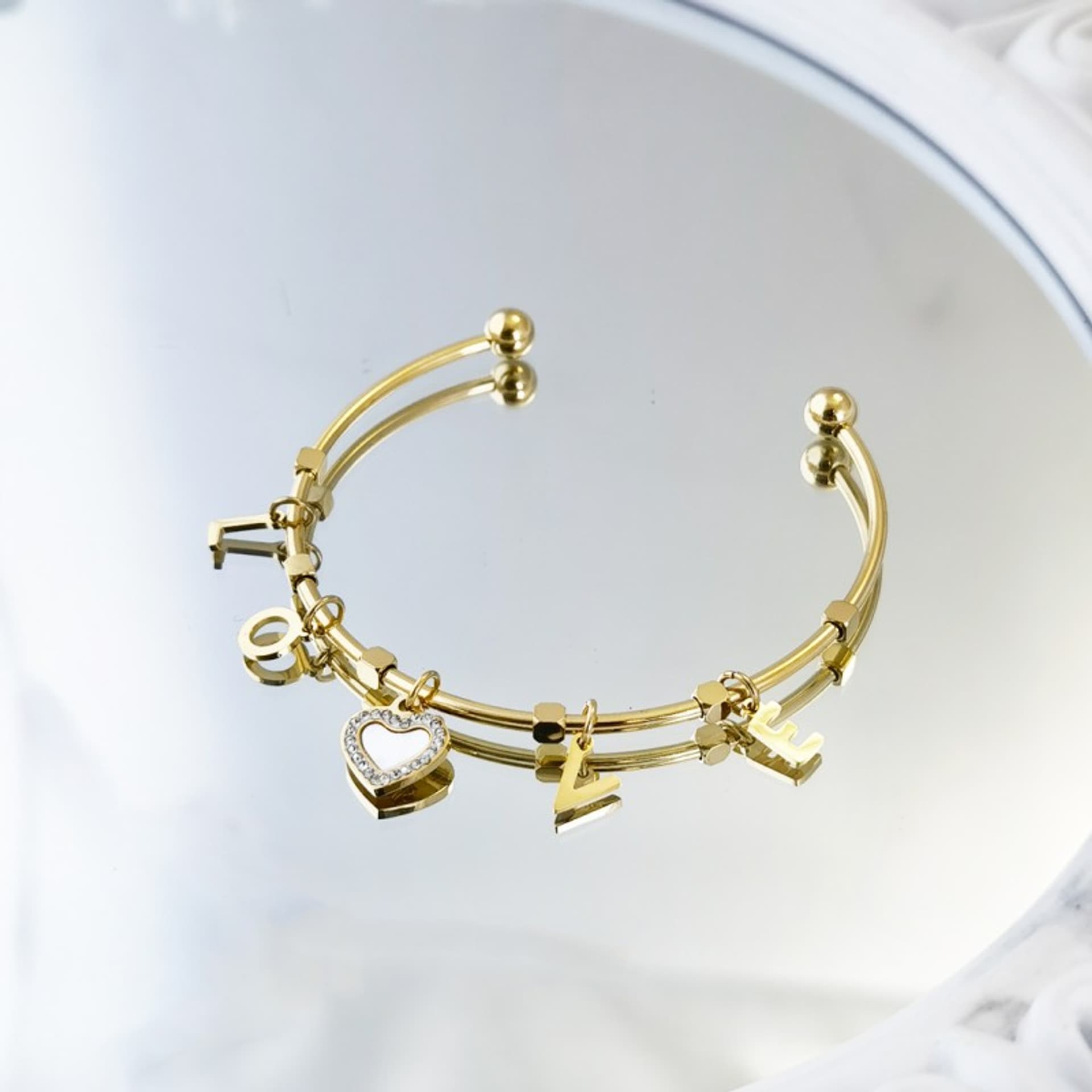 

Bransoletka na rękę stal chirurgiczna pozłacana 14k złotem BST1376