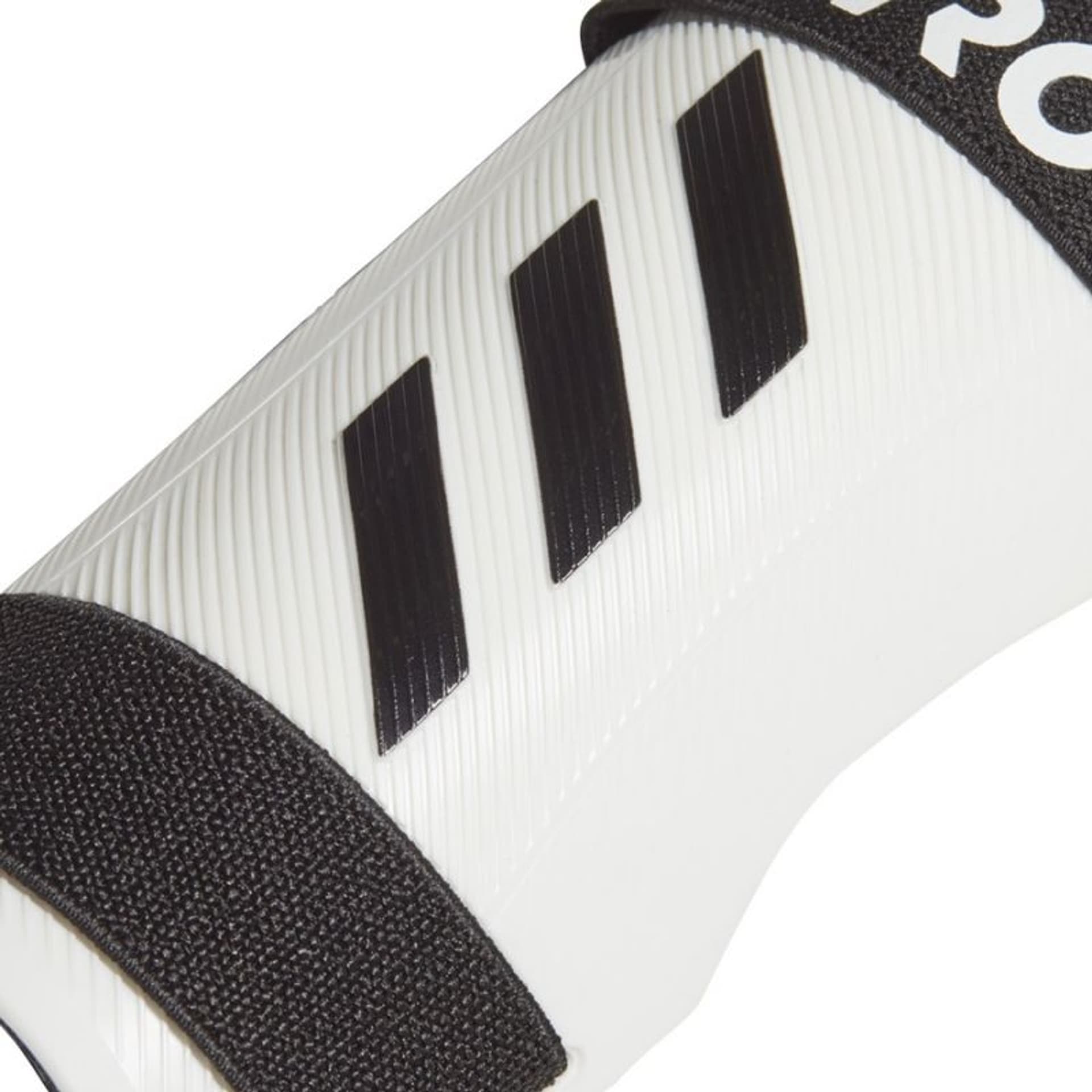 

Nagolenniki adidas Tiro SG Trn M (kolor Biały. Czarny, rozmiar L)