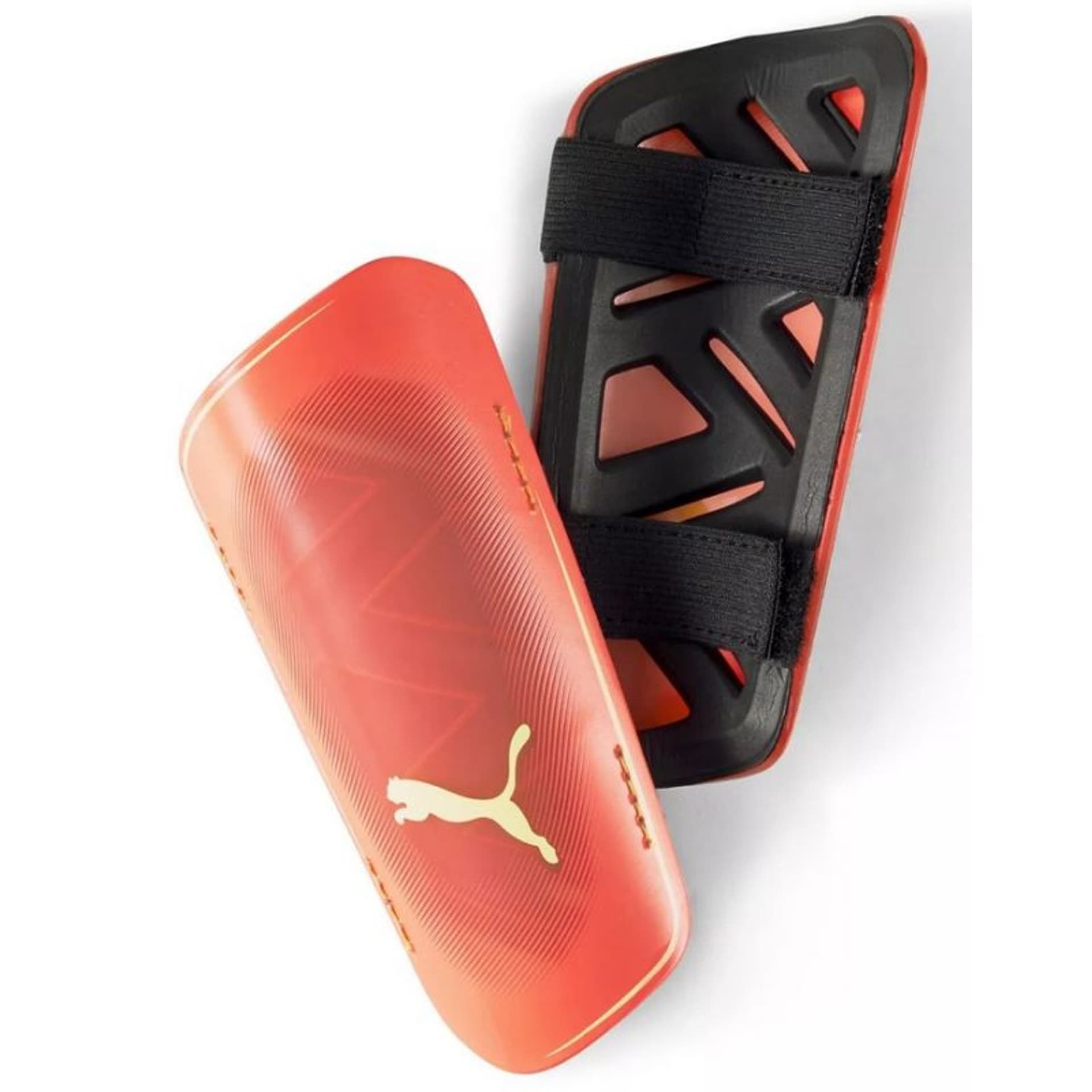 

Nagolenniki Puma Ultra Light Strap 030834 (kolor Czarny. Pomarańczowy, rozmiar XS)