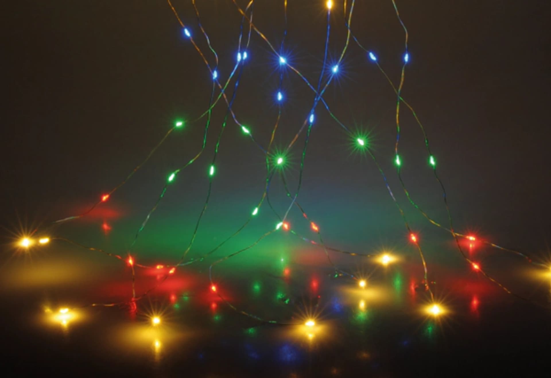 

Lampki świąteczne i na srebrnym druciku kurtyna 200 LED kolorowe