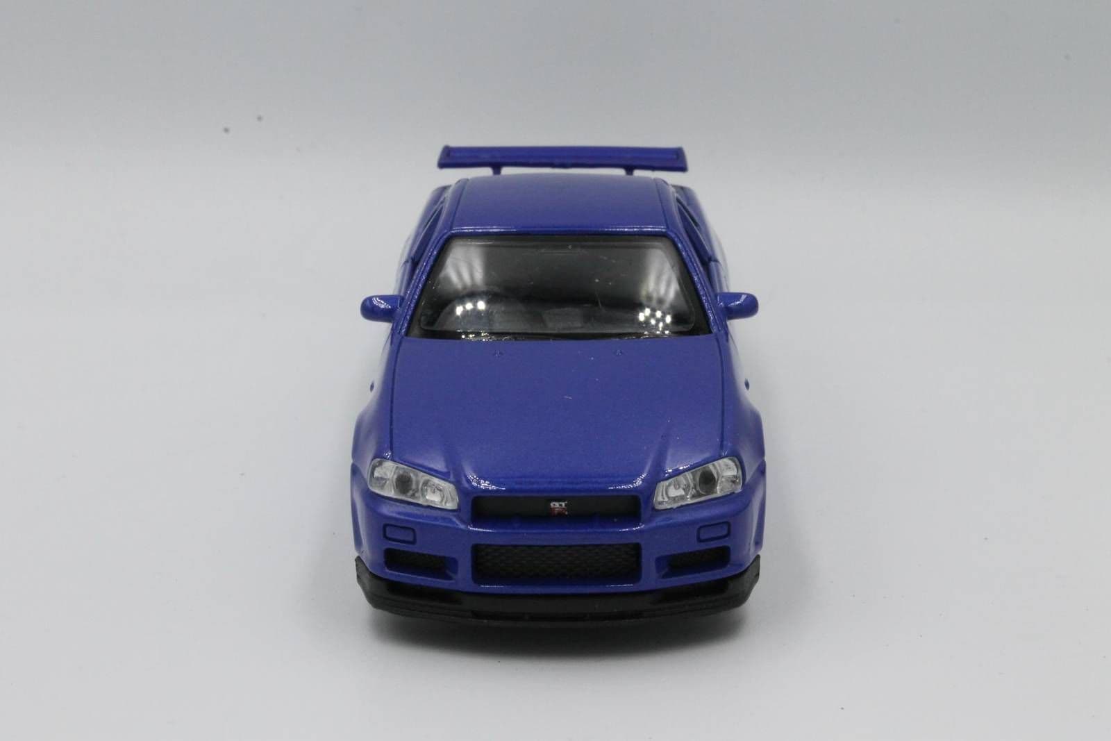 

MODEL METALOWY WELLY Nissan Skyline GT-R R34 1:34