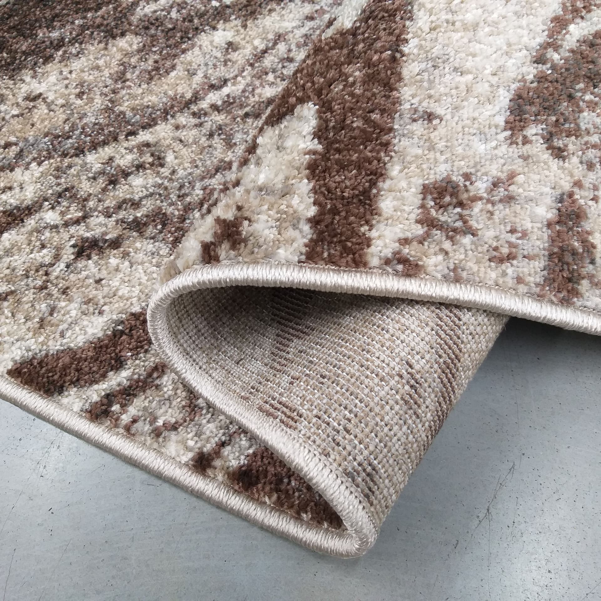 

Chodnik dywanowy Panamero 13 - szerokość od 60 cm do 150 cm brązowy 150 cm