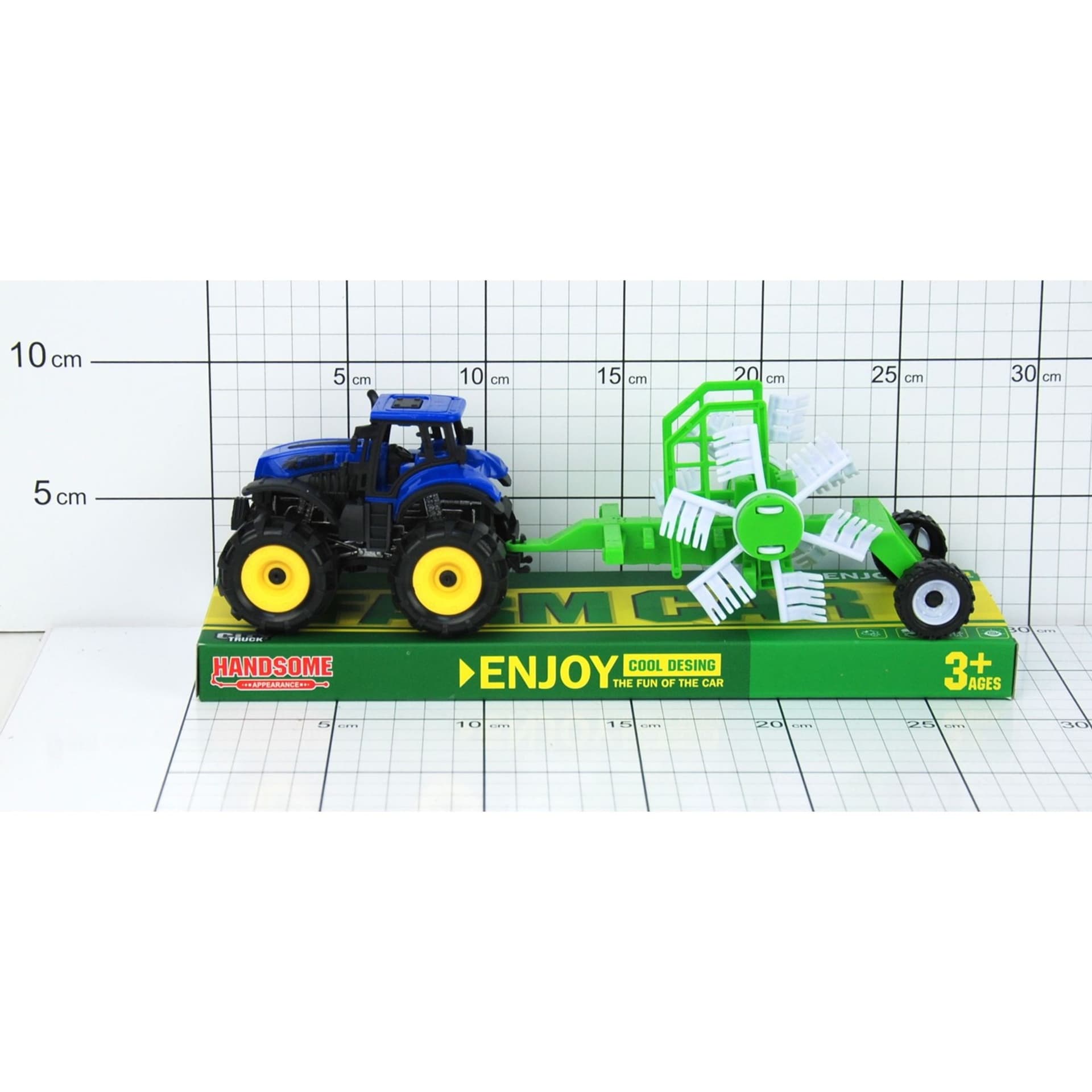 

TRAKTOR Z PRZYCZEPĄ POD KLOSZEM