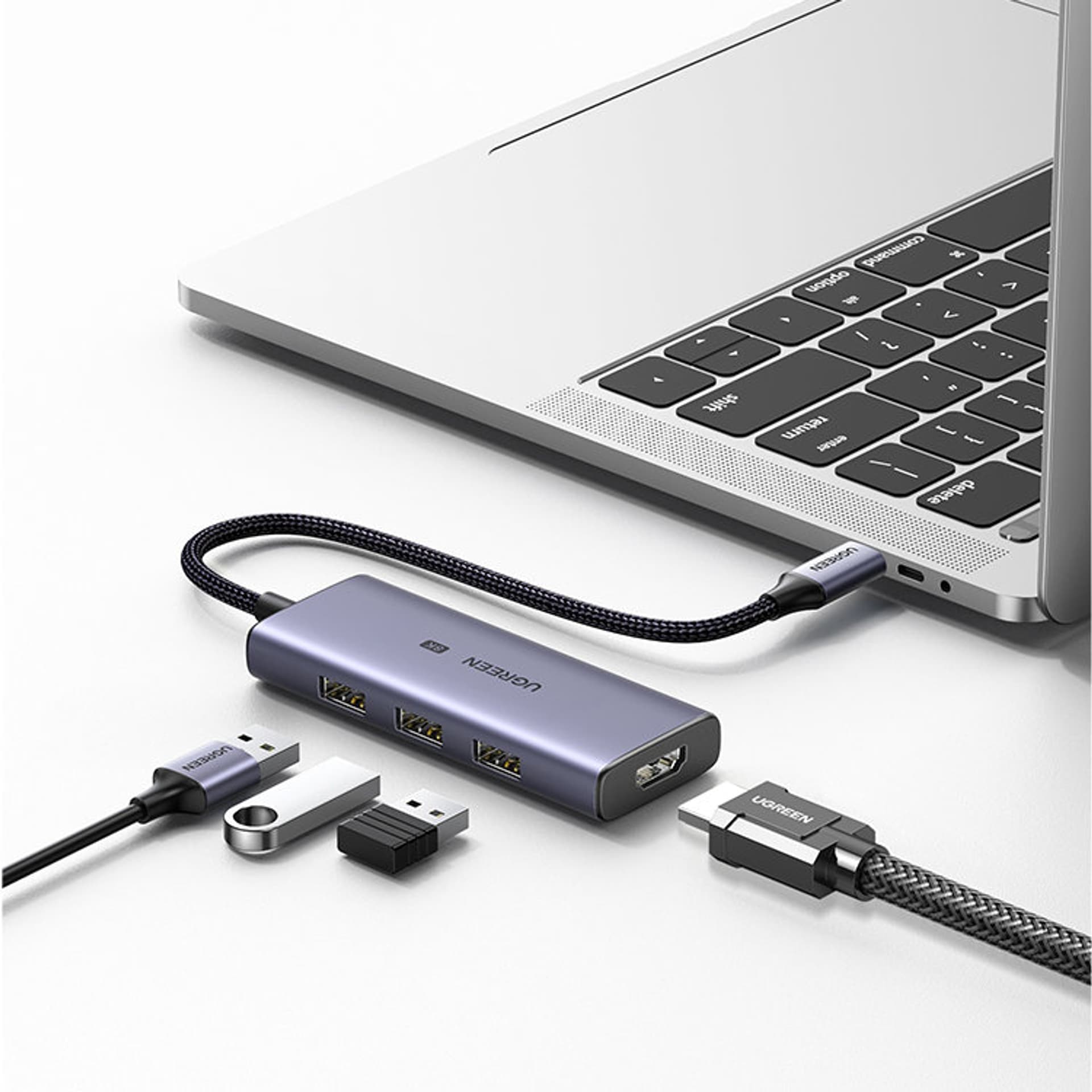 

Ugreen 4w1 wielofunkcyjny HUB USB Typ C - 3x USB 3.2 Gen 1 / HDMI 2.1 8K 30Hz szary (50629 CM500)