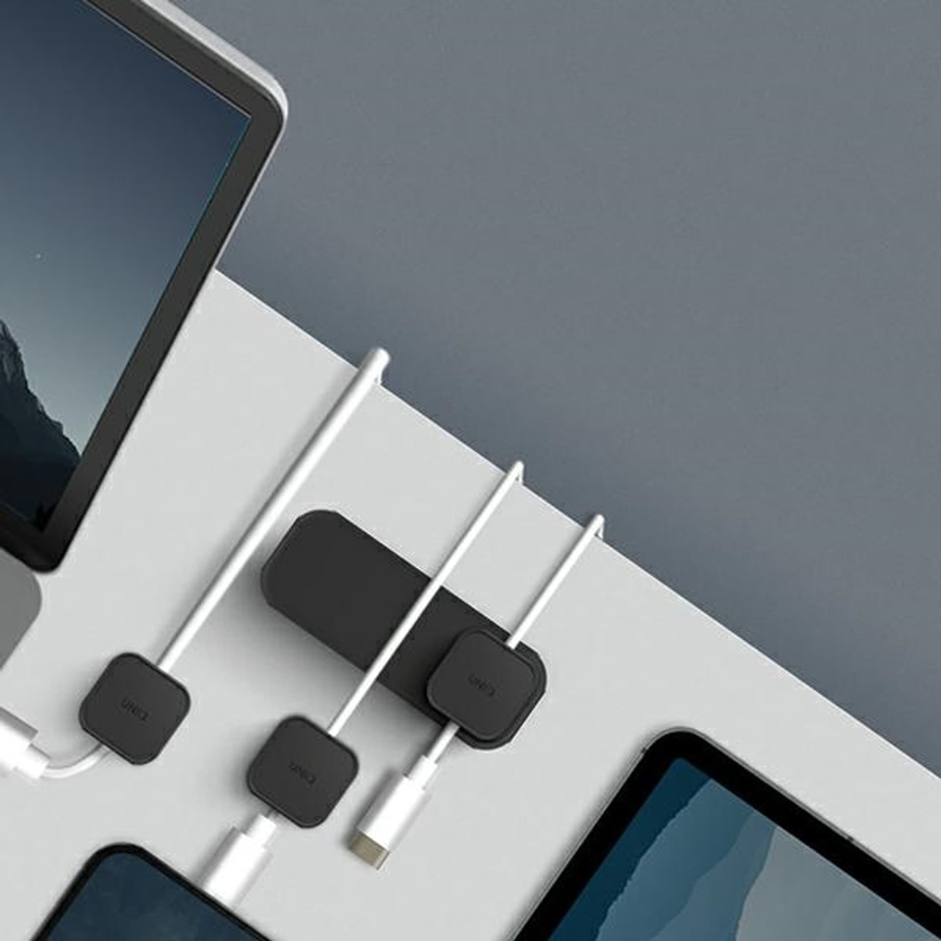 

UNIQ Pod Mag magnetyczny organizer do kabli + baza ciemnoszary/charcoal dark grey