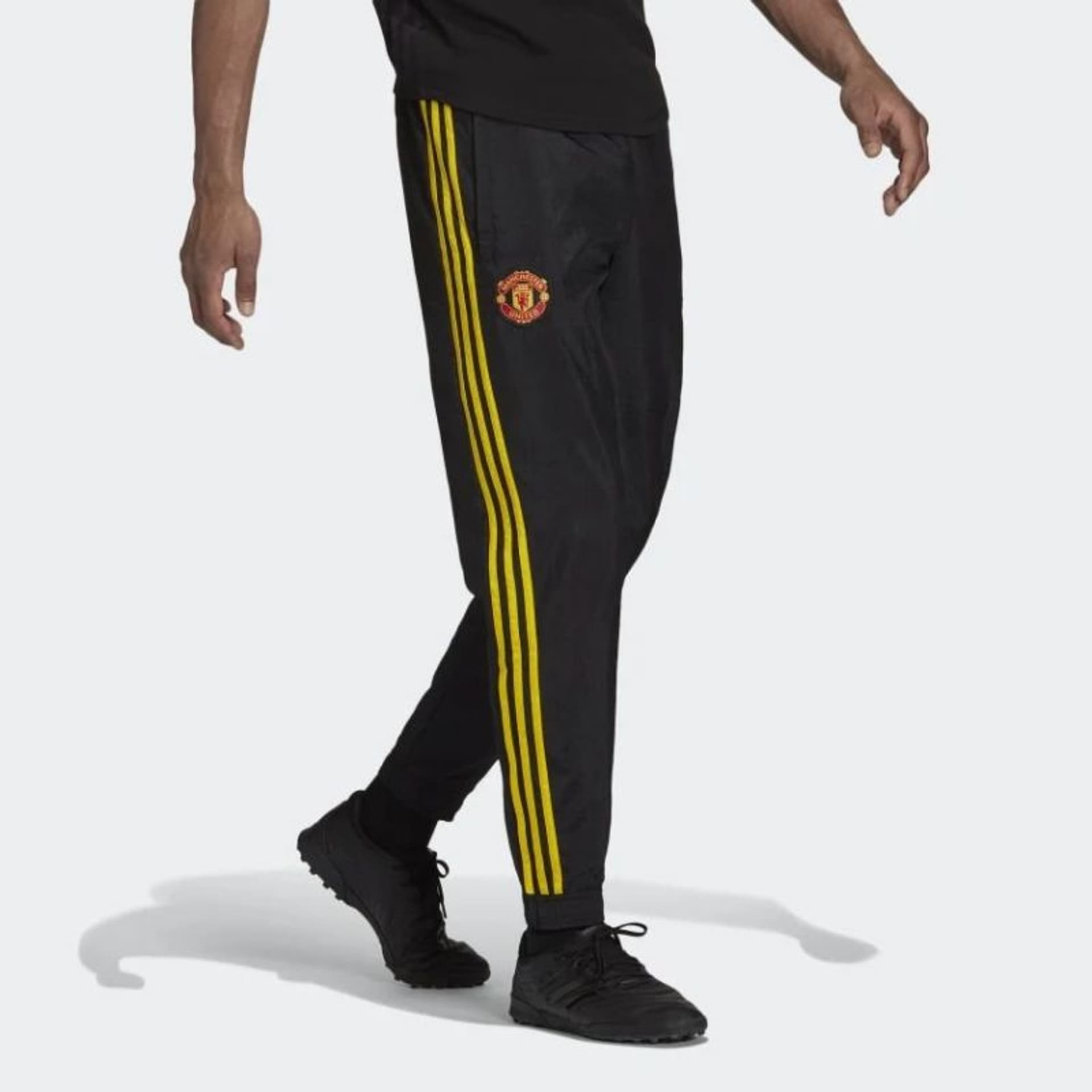 

Spodnie adidas Manchester United F.C. Icon Woven Pant M (kolor Czarny, rozmiar XS)