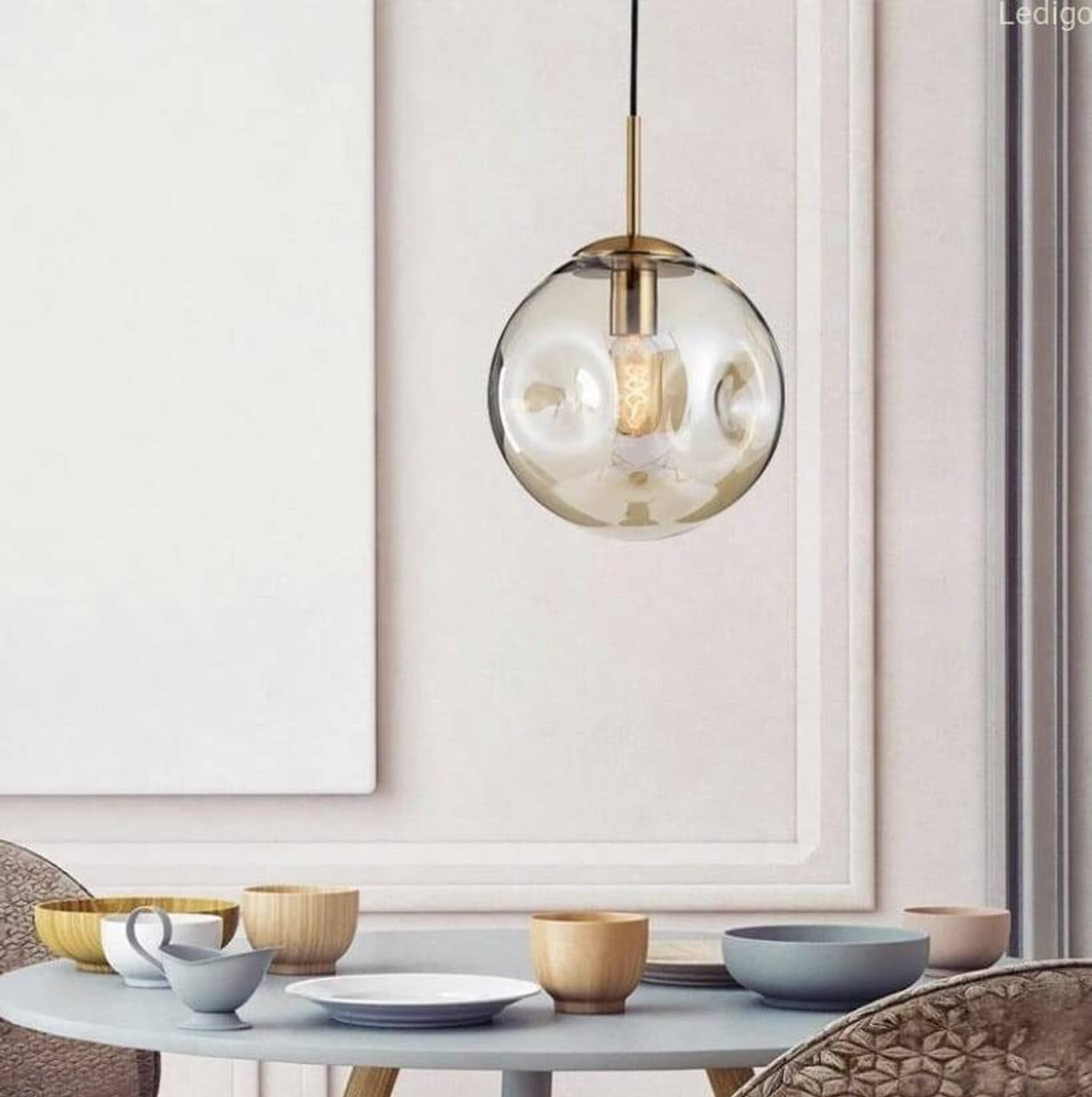 

Lampa wisząca szklana kula LAVA AMBER