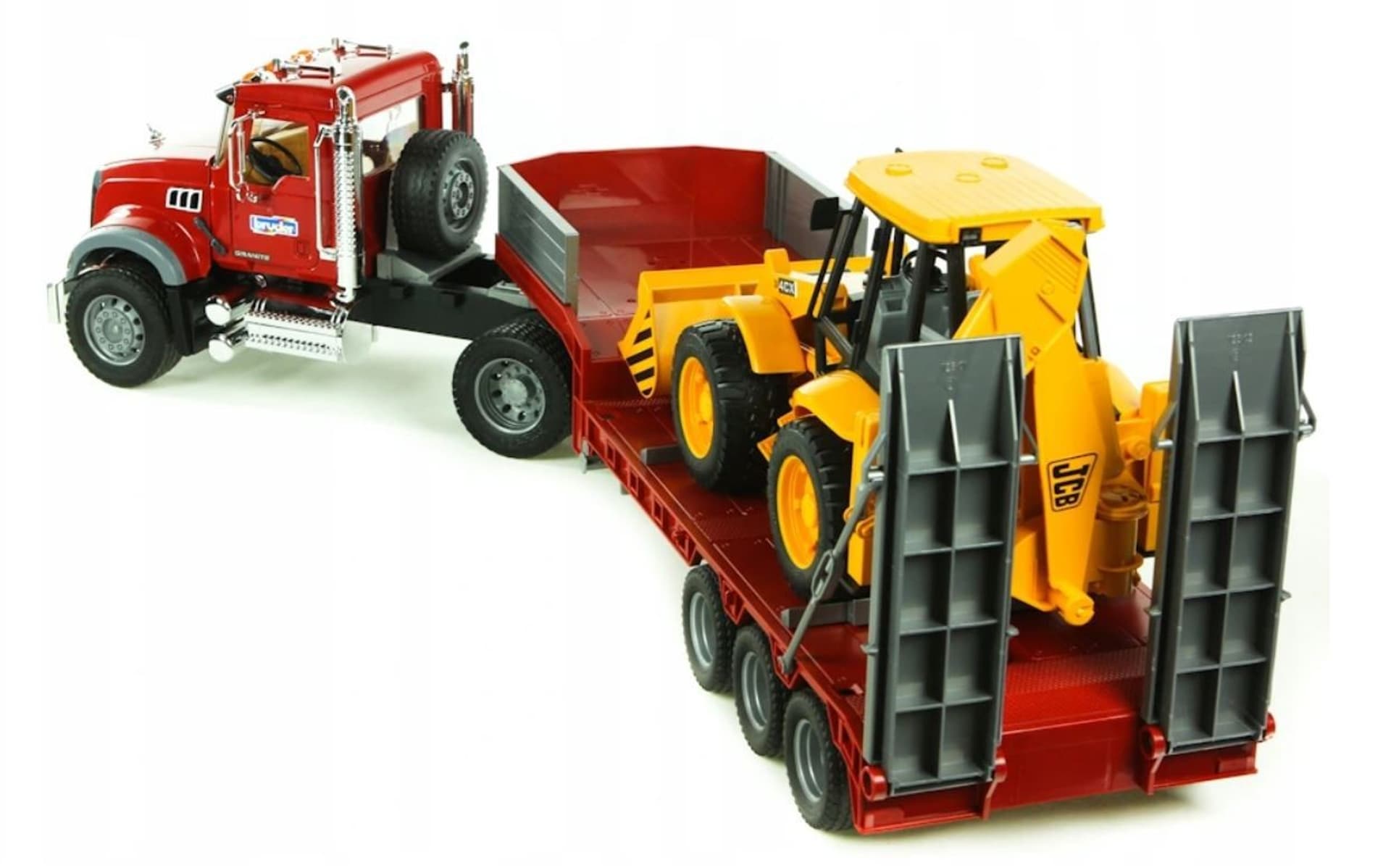 

Pojazd MACK z naczepą i koparko-ładowarka JCB