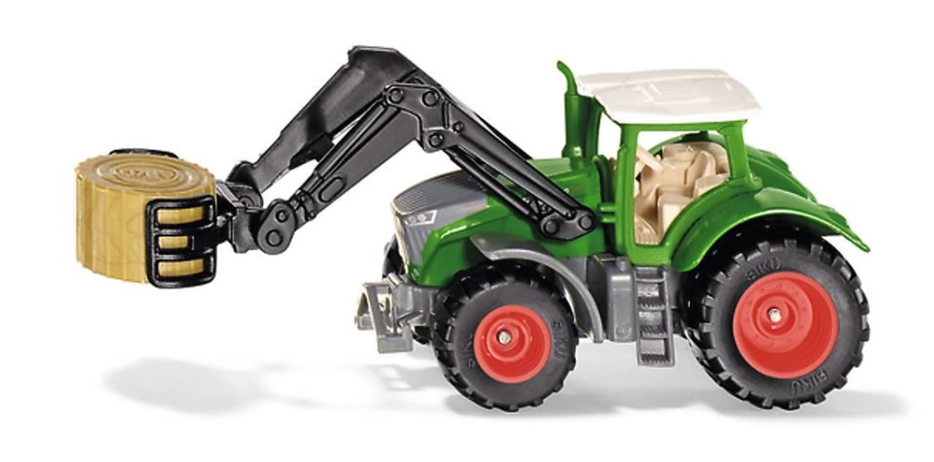 

Taktor Fendt z chwytakiem do balotow