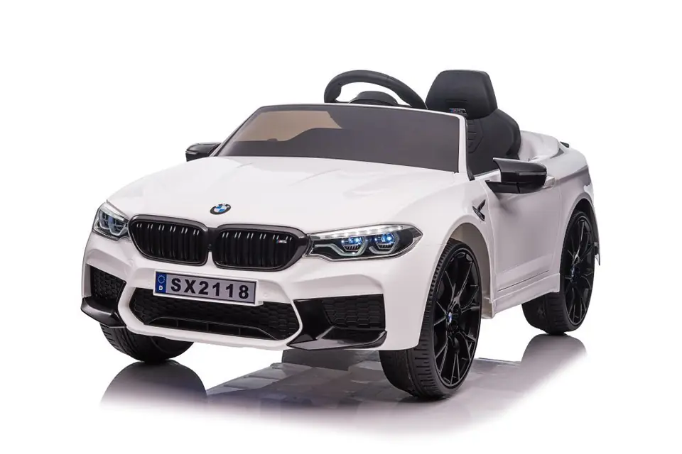 ⁨Battery-powered vehicle BMW M5 white⁩ at Wasserman.eu