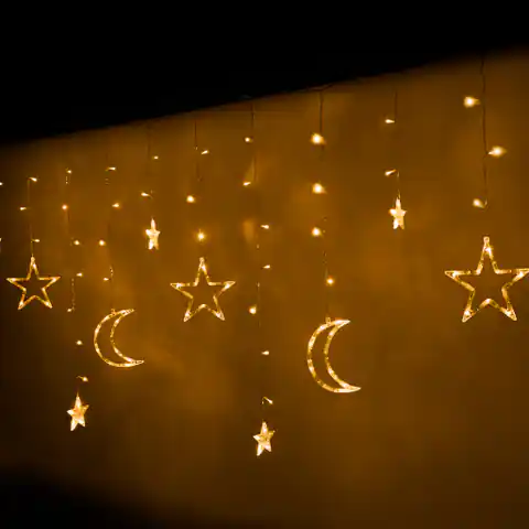 ⁨Lampki LED kurtyna księżyc gwiazdki 2,5m 138LED ciepły biały⁩ w sklepie Wasserman.eu