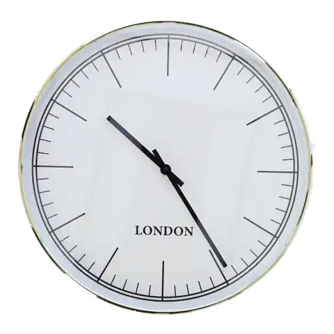 ⁨Slimer clock round white⁩ at Wasserman.eu