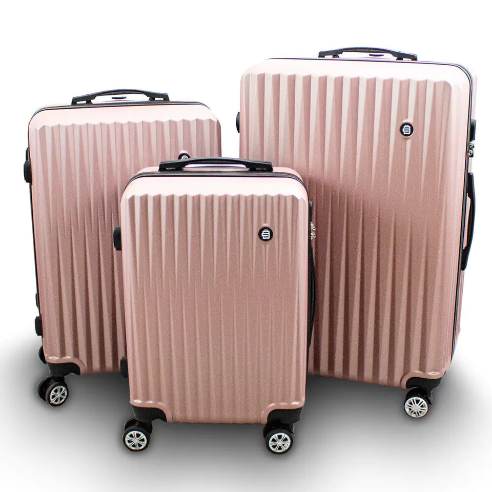 ⁨Set of suitcases Trolleys Golden-pink SET 3 pcs durable⁩ at Wasserman.eu