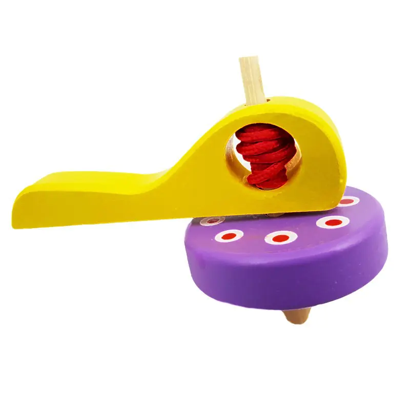 ⁨Wooden spinning top yellow-purple⁩ at Wasserman.eu