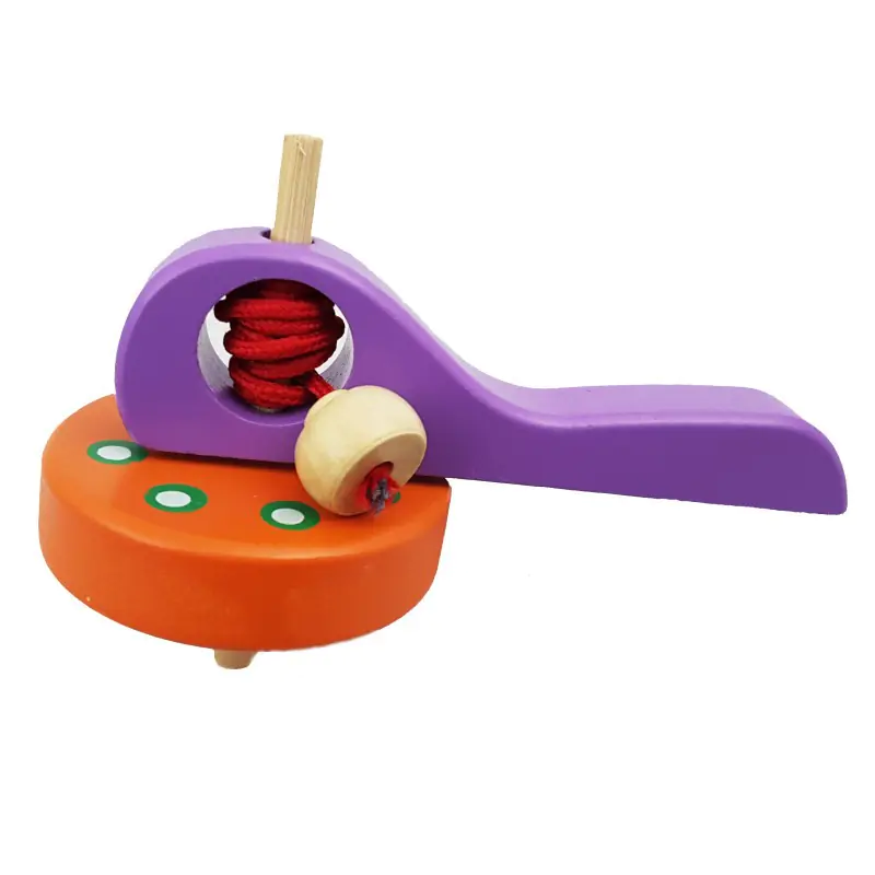 ⁨Wooden spinning top purple-orange⁩ at Wasserman.eu