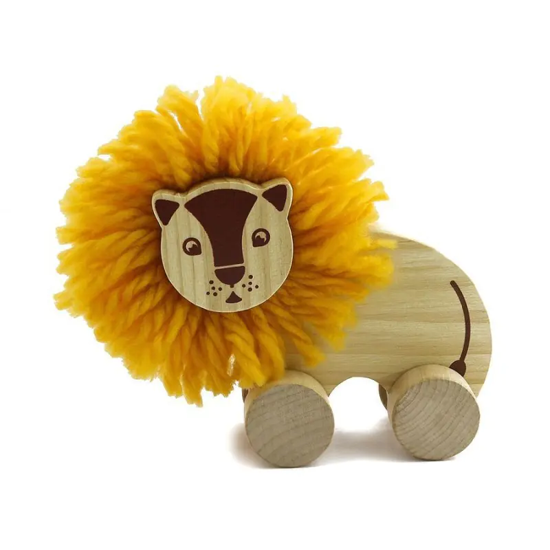 ⁨Wooden lion pompom - do it yourself⁩ at Wasserman.eu