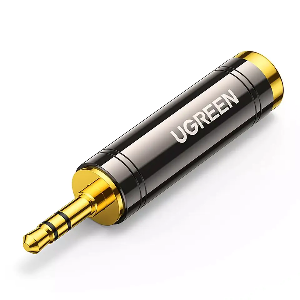 ⁨Adapter UGREEN  przejściówka audio z 3.5mm (męski) na 6,35mm mini jack (żeński) szary (AV168)⁩ w sklepie Wasserman.eu