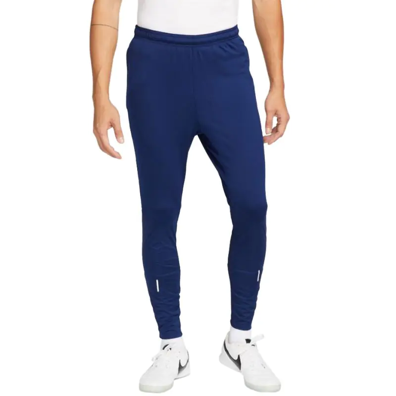 ⁨Spodnie Nike Therma-Fit Strike Pant Kwpz Winter Warrior M DC9159 (kolor Niebieski, rozmiar L)⁩ w sklepie Wasserman.eu