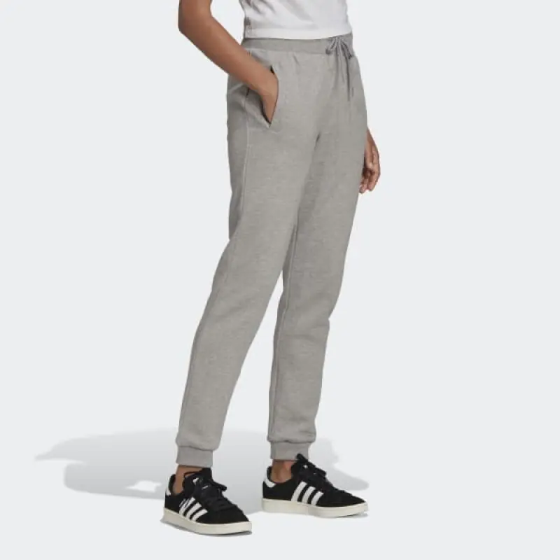 ⁨Spodnie adidas Adicolor Essentials Slim Joggers Pants W (kolor Szary/Srebrny, rozmiar 30)⁩ w sklepie Wasserman.eu