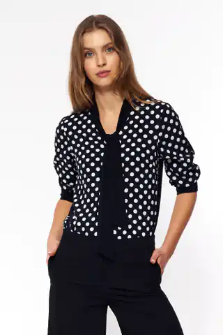⁨Subtelna bluzka z wiązaniem - czarny/grochy - B140 (kolor czarny/grochy, rozmiar 36)⁩ w sklepie Wasserman.eu