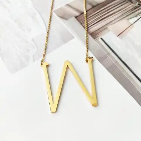 ⁨Necklace surgical steel letter W plated with gold NST995W⁩ at Wasserman.eu