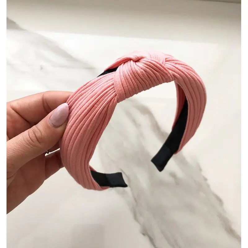 ⁨Turban band made of O210R rose material⁩ at Wasserman.eu