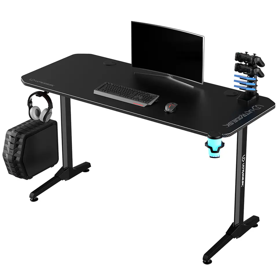 ⁨ULTRADESK Biurko dla gracza FRAG - BLACK V3, 140x60 cm, 76 cm, z podkładką pod mysz, uchwyt na słuchawki i napój⁩ w sklepie Wasserman.eu