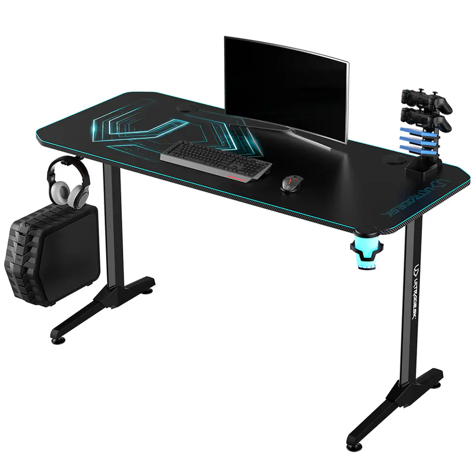 ⁨ULTRADESK Biurko dla gracza FRAG - BLUE V3, 140x60 cm, 76 cm, z podkładką pod mysz, uchwyt na słuchawki i napój⁩ w sklepie Wasserman.eu