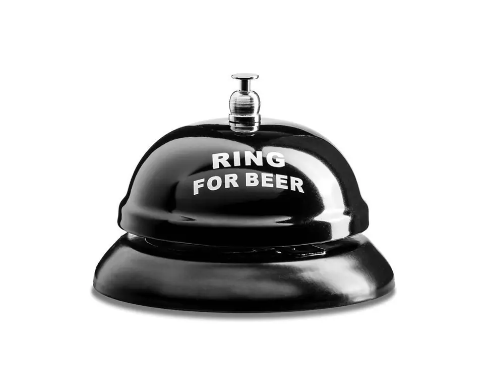 ⁨Desk beer bell⁩ at Wasserman.eu