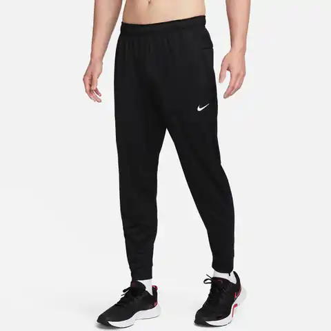 ⁨Spodnie Nike Totality M FB7509 (kolor Czarny, rozmiar L)⁩ w sklepie Wasserman.eu