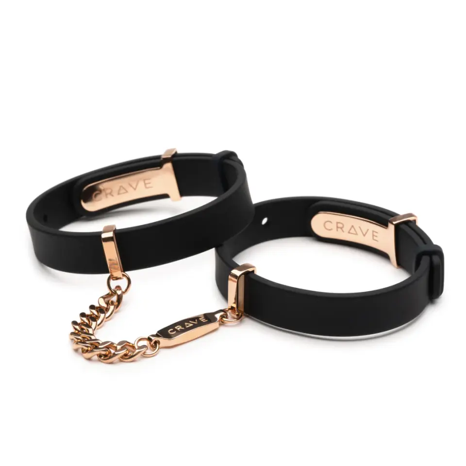 ⁨Crave ID Cuffs mankiety skorzane czarne z elementami rożowego złota⁩ w sklepie Wasserman.eu