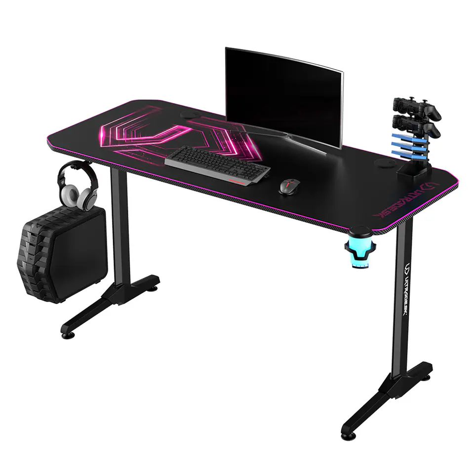 ⁨ULTRADESK Biurko dla gracza FRAG - PINK V3, 140x60 cm, 76 cm, z podkładką pod mysz, uchwyt na słuchawki i napój⁩ w sklepie Wasserman.eu