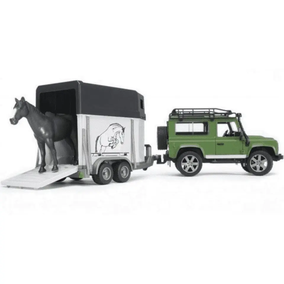 ⁨Land Rover with horse trailer and BRUDER horse figurine⁩ at Wasserman.eu