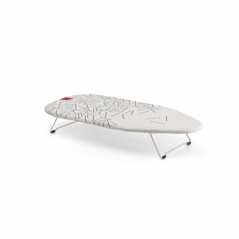 ⁨Ironing board on the Rayen table⁩ at Wasserman.eu