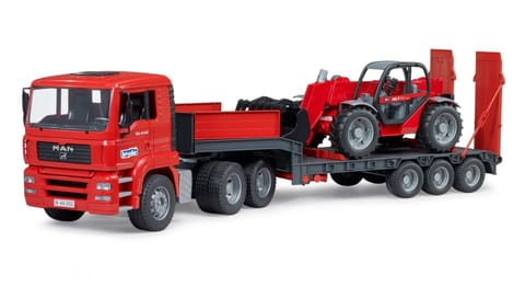 ⁨MAN TGA with low bed trailer and loader⁩ at Wasserman.eu