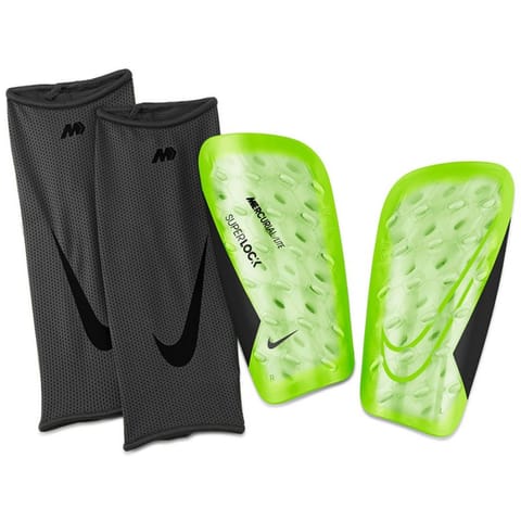 ⁨Ochraniacze piłkarskie Nike Mercurial Lite SuperLock DN3609 (kolor Czarny. Zielony, rozmiar M)⁩ w sklepie Wasserman.eu