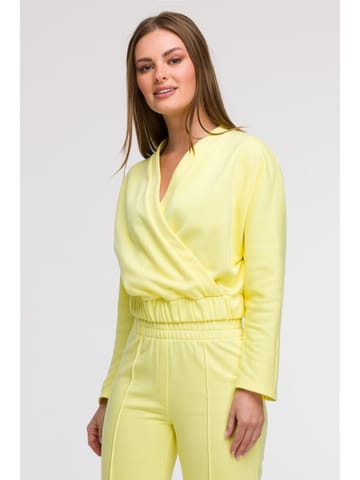⁨B292 Bluza z kopertowym dekoltem - cytrynowa (kolor żółty, rozmiar XL)⁩ w sklepie Wasserman.eu