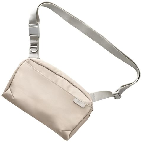 ⁨Torba UNIQ Arden Sling 2L beżowy⁩ w sklepie Wasserman.eu