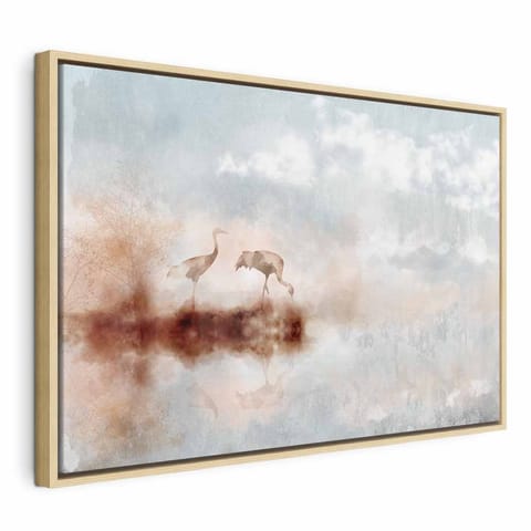 ⁨Obraz - Żurawie o poranku (1-częściowy) szeroki (rozmiar 90x60, wykończenie W ramie drewnianej naturalnej)⁩ w sklepie Wasserman.eu