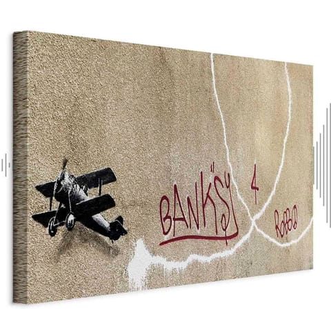 ⁨Obraz - Samolot Banksy (1-częściowy) - graffiti czerwone napisy na tle muralu (rozmiar 30x20, wykończenie Akustyczny)⁩ w sklepie Wasserman.eu