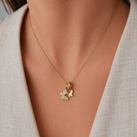 ⁨Naszyjnik stal szlachetna pozłacana 14k złotem, motyle NST2271⁩ w sklepie Wasserman.eu