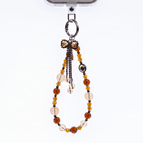 ⁨Crong Phone Charm - Smycz zawieszka do telefonu (Gold Bow)⁩ w sklepie Wasserman.eu