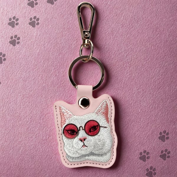 Etui na lokalizator / brelok Nimmy       Glasses Cool Cat różowy