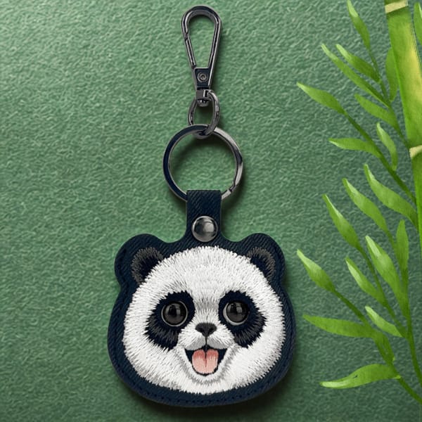 Etui na lokalizator / brelok Nimmy New   Big Eyed Pet 2.0 Panda czarny