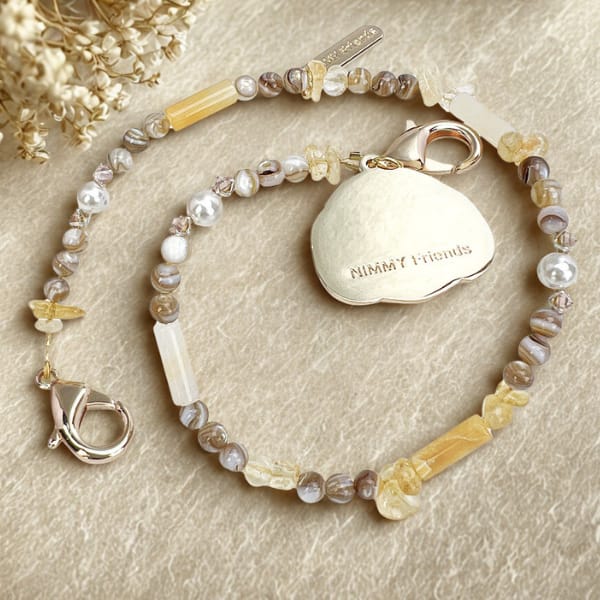 Zawieszka na torebkę handstrap Nimmy     Magnetic fashion brązowy